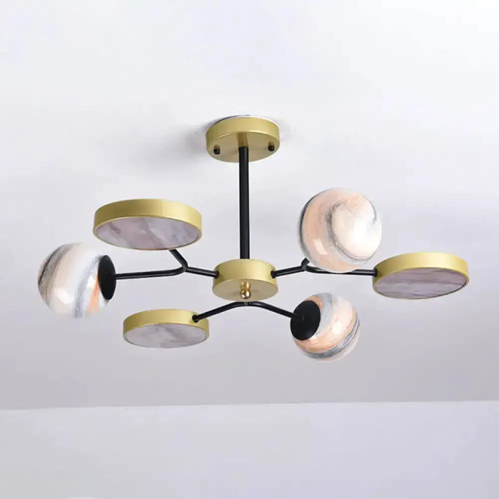 Modern handblown glass gold chandelier with marble globe shades and black arms living pendant on Tampa Home & Garden Store