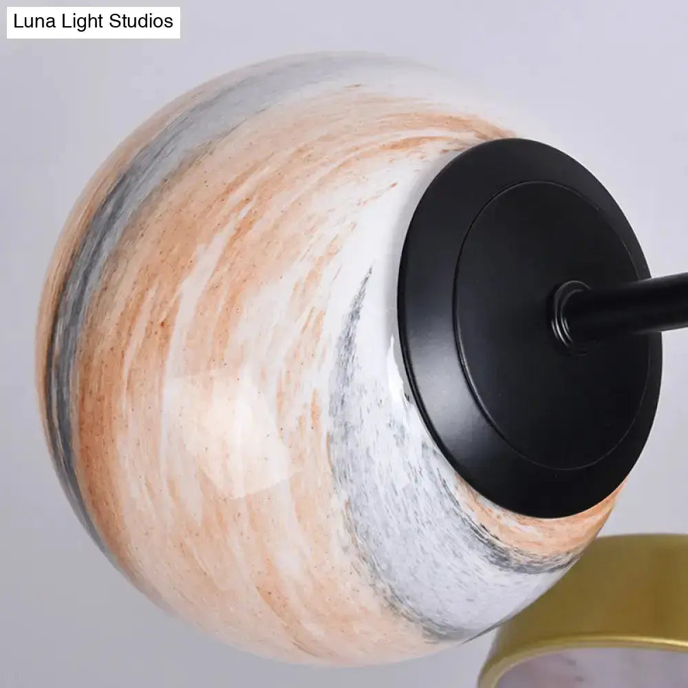 Decorbites hand blown glass chandelier pendant with peach gray white globe and black mount on Tampa Home & Garden Store