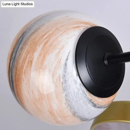 Decorbites hand blown glass chandelier pendant with peach gray white globe and black mount on Tampa Home & Garden Store
