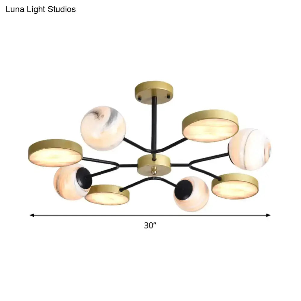 Modern hand-blown glass gold chandelier 30-inch span with gold discs and black arms on Tampa Home & Garden Store