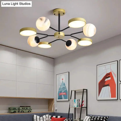 Modern hand blown glass gold chandelier with black arms and swirled globes Decorbites on Tampa Home & Garden Store