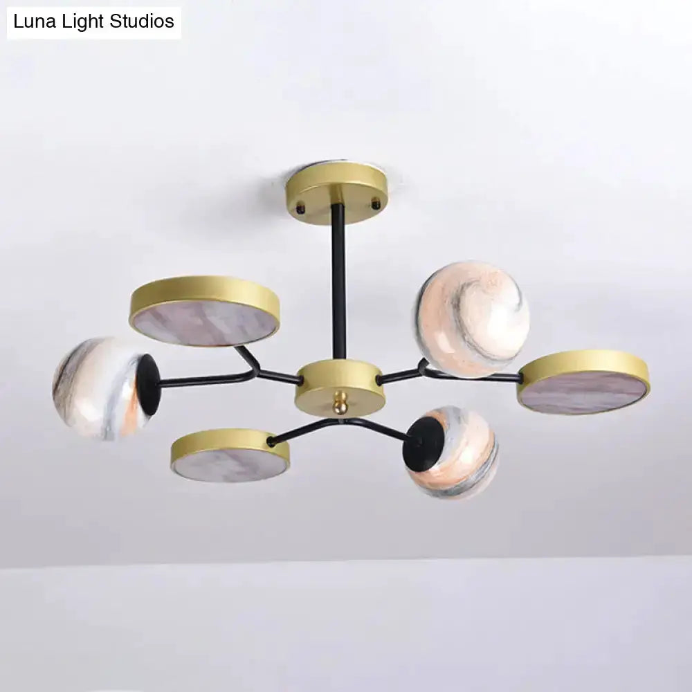 Modern hand blown glass gold chandelier with black arms and six discs pendant light on Tampa Home & Garden Store
