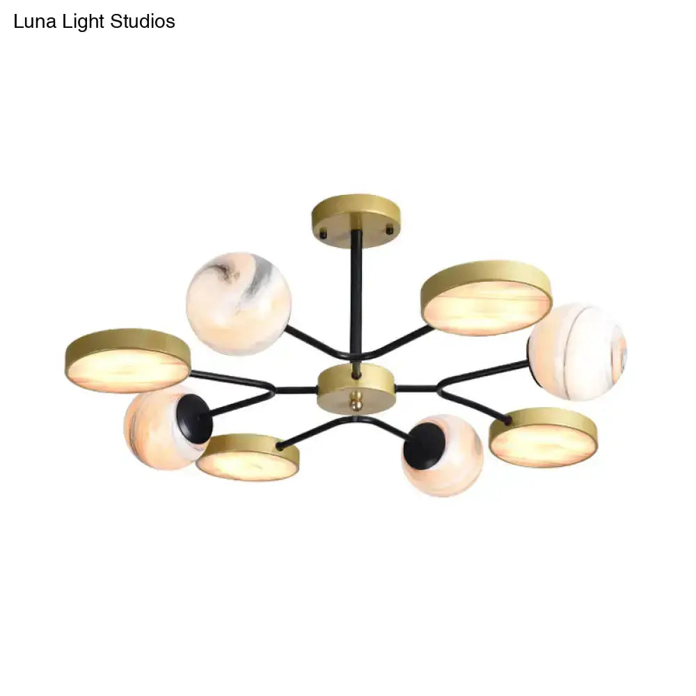Modern hand blown glass gold chandelier living light with 8-light globes and black arms on Tampa Home & Garden Store
