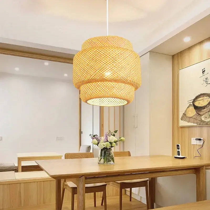 Bamboo Chinese Pendant Light by Decorbites, woven wicker shade over a wooden dining table on Tampa Home & Garden Store