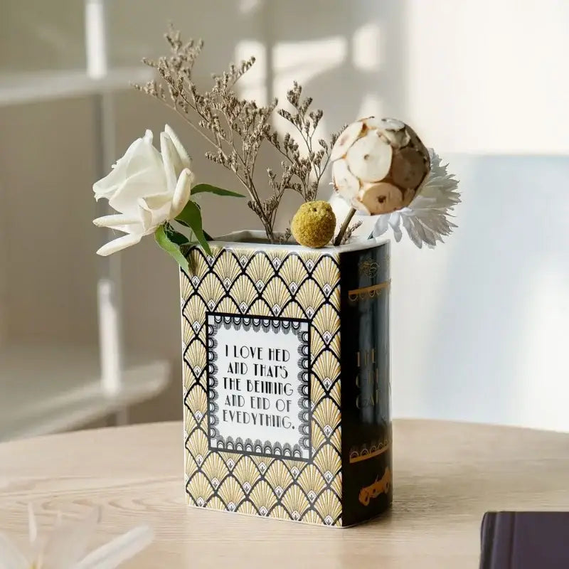 Navy ceramic book vase by Decorbites with gold geometric pattern and dried flowers on Tampa Home & Garden Store