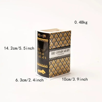 Navy ceramic book vase by Decorbites; book-shaped vase with Gatsby-inspired gold pattern on Tampa Home & Garden Store