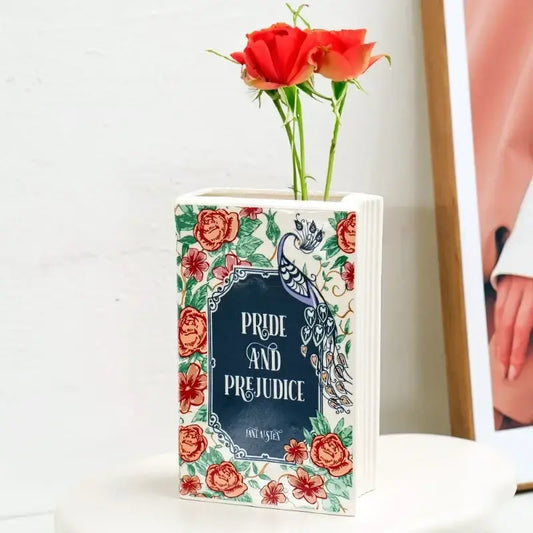 Navy ceramic book vase by Decorbites with floral border and Pride & Prejudice label on Tampa Home & Garden Store