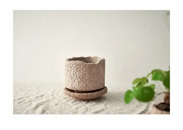 Rustic Terracotta Ceramic Vase and Floral Display