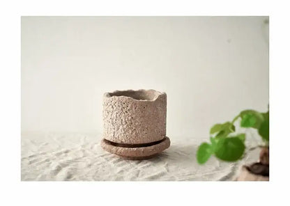 Rustic Terracotta Ceramic Vase and Floral Display