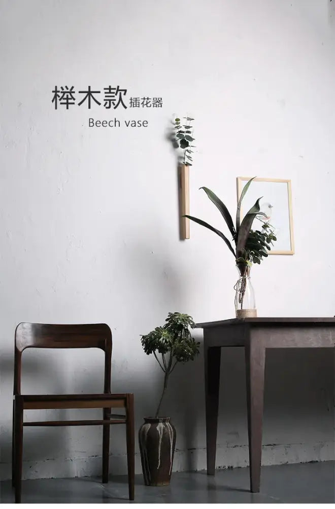 Dark Wood Wall Vase by Decorbites mounted on wall with eucalyptus sprig on Tampa Home & Garden Store