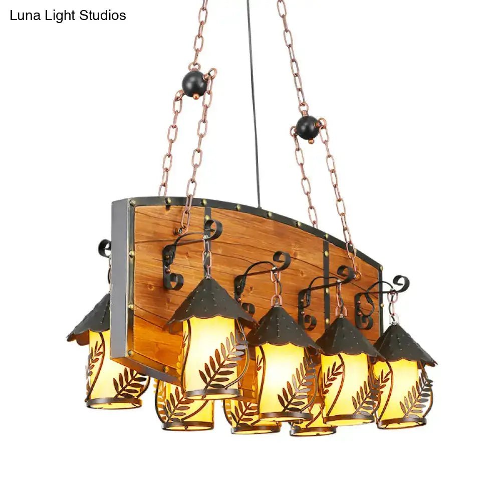 Rustic wood and black lantern island pendant light with six amber lanterns on Tampa Home & Garden Store