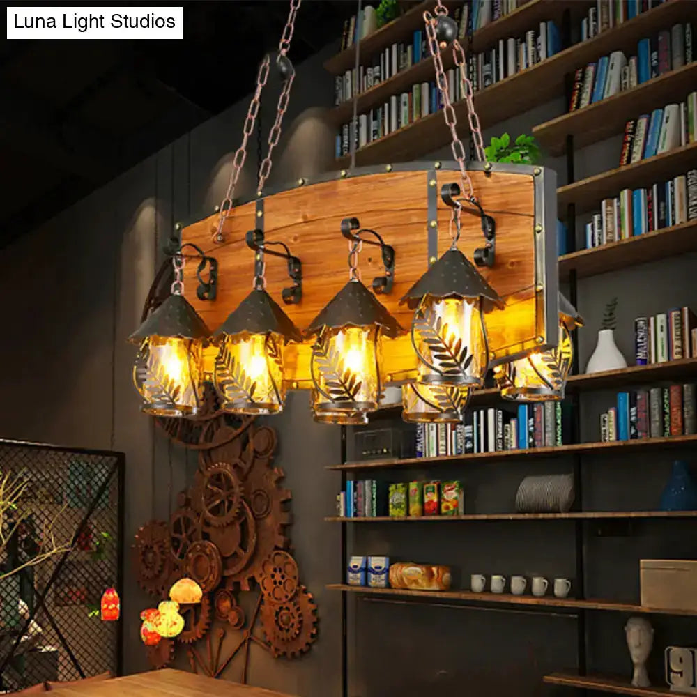 Decorbites rustic wood and black lantern island pendant light with five amber glass lanterns on Tampa Home & Garden Store