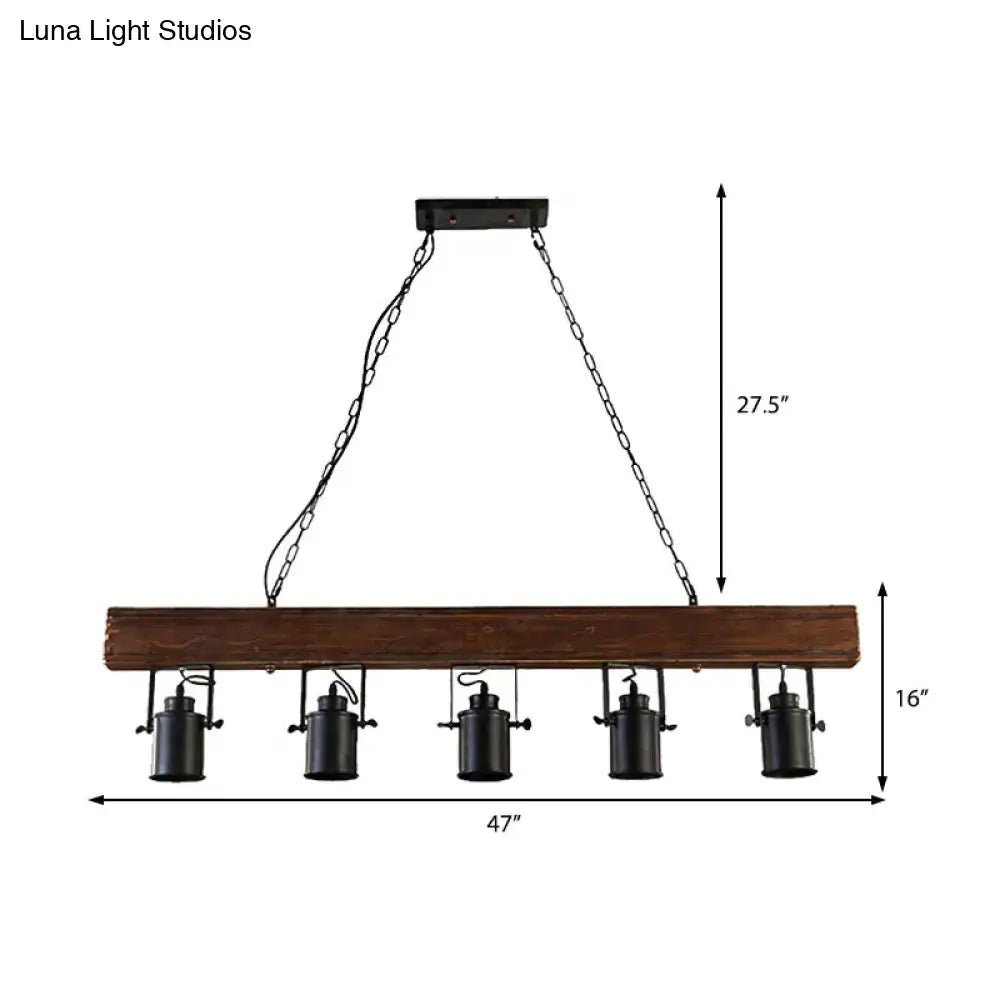 Black Metal Kitchen Pendant by Decorbites featuring a rustic wood beam and five black metal pendant lights on chains on Tampa Home & Garden Store