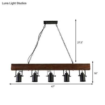 Black Metal Kitchen Pendant by Decorbites featuring a rustic wood beam and five black metal pendant lights on chains on Tampa Home & Garden Store