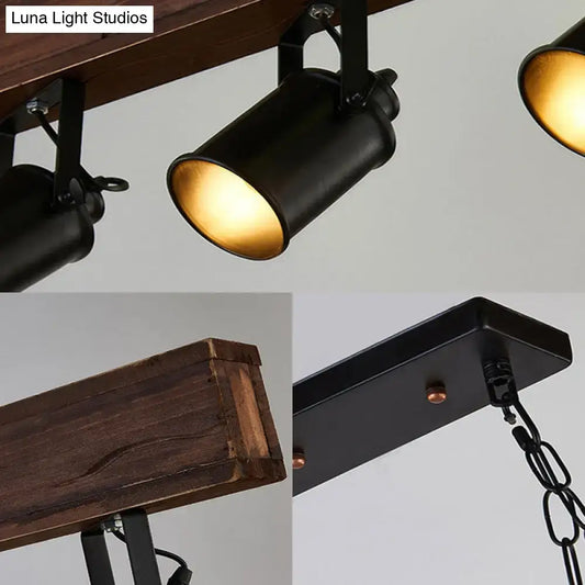 Three black metal kitchen pendant lights with cylindrical shades and amber interiors on Tampa Home & Garden Store