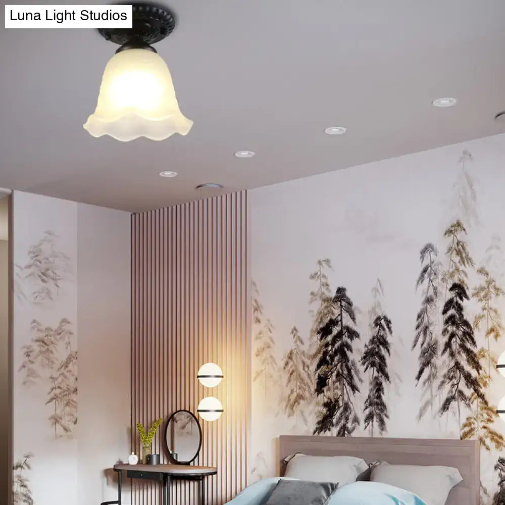 White glass ceiling light flush mount by Decorbites in a modern bedroom with wood slat divider on Tampa Home & Garden Store