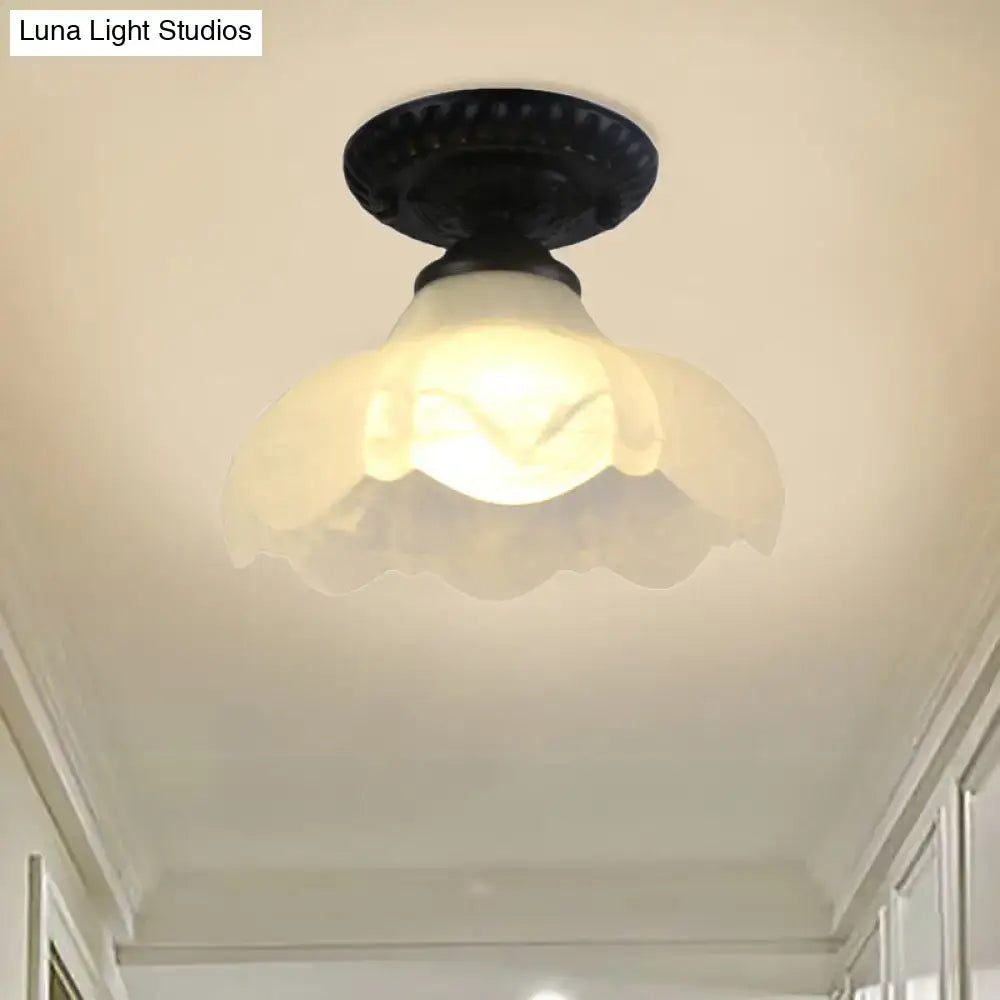 White glass ceiling light Decorbites flush mount with scalloped petal shade on Tampa Home & Garden Store