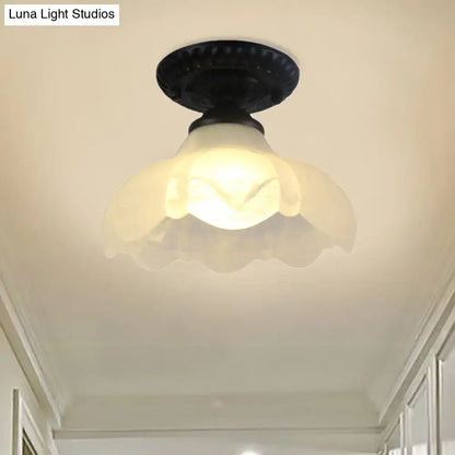 White glass ceiling light Decorbites flush mount with scalloped petal shade on Tampa Home & Garden Store