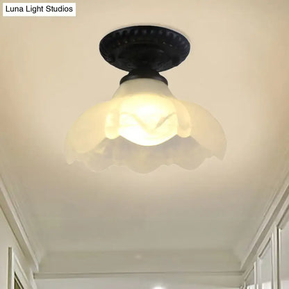 White glass flush mount ceiling light by Decorbites with a scalloped shade on Tampa Home & Garden Store