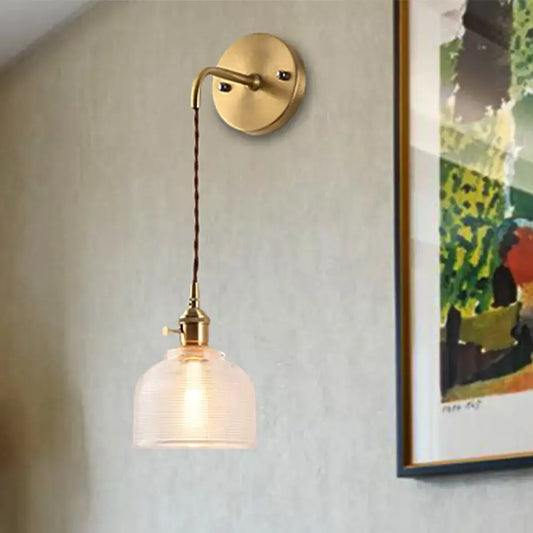 Decorbites Textured Glass Dome Sconce with brass wall plate and ribbed glass shade on Tampa Home & Garden Store