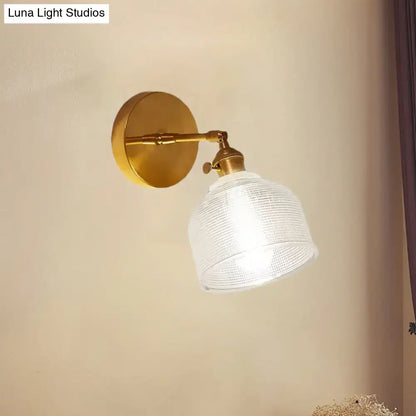 Brass frosted dome sconce with ribbed glass shade and wall mount on Tampa Home & Garden Store