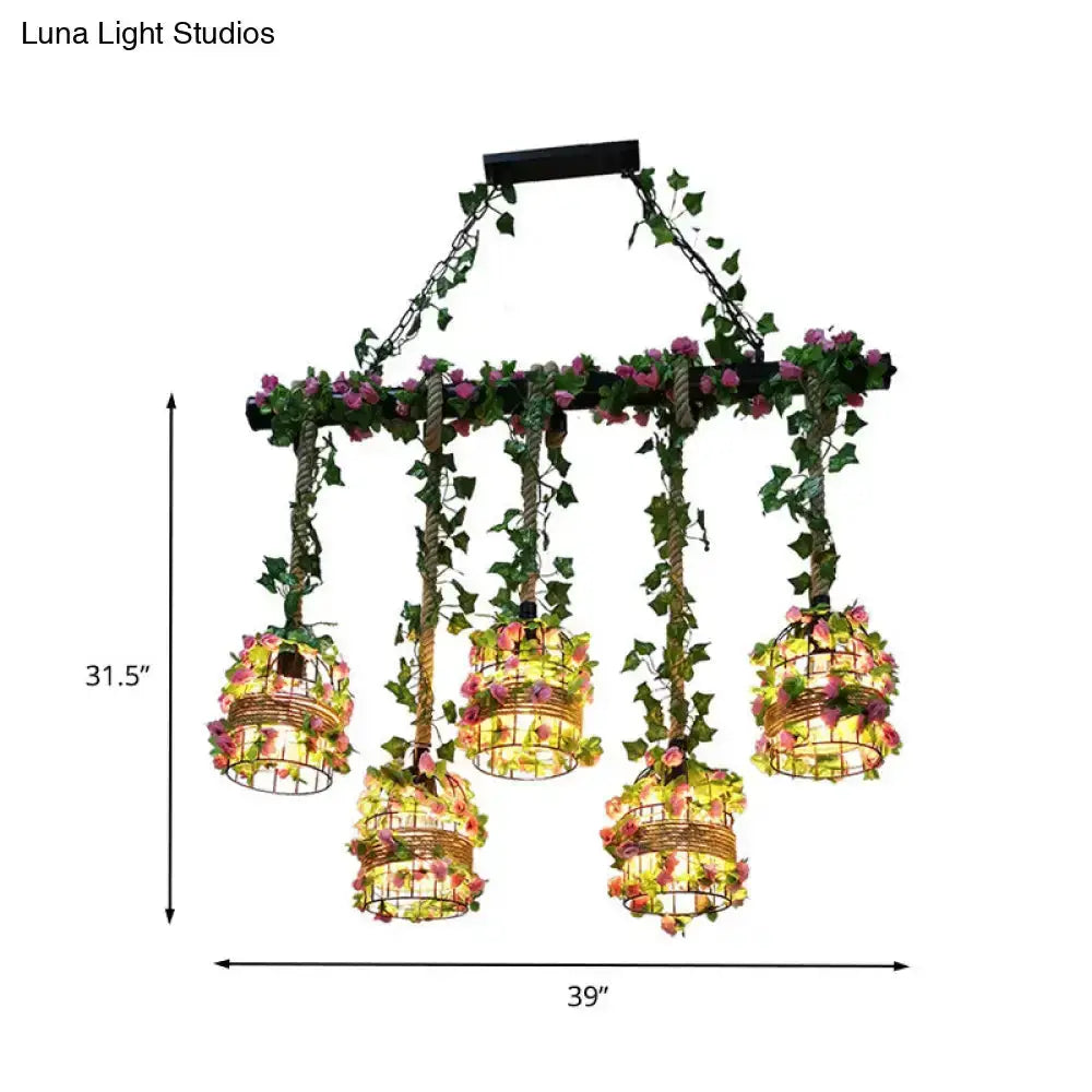 Decorbites industrial black cage island pendant lights with six flower-adorned cages on Tampa Home & Garden Store
