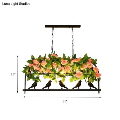 Industrial metal birdcage flower pendant light by Decorbites, black frame with pink roses on Tampa Home & Garden Store