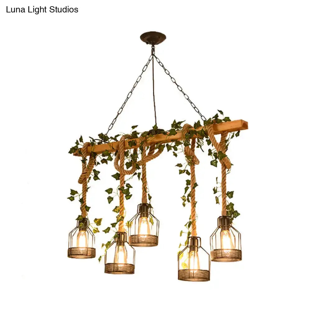 Rustic wood and rope cage island pendant light with ivy, warm amber bulbs by Decorbites on Tampa Home & Garden Store