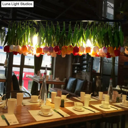 Green Tulip LED Pendant by Decorbites, tulip-inspired LED light over a dining table on Tampa Home & Garden Store