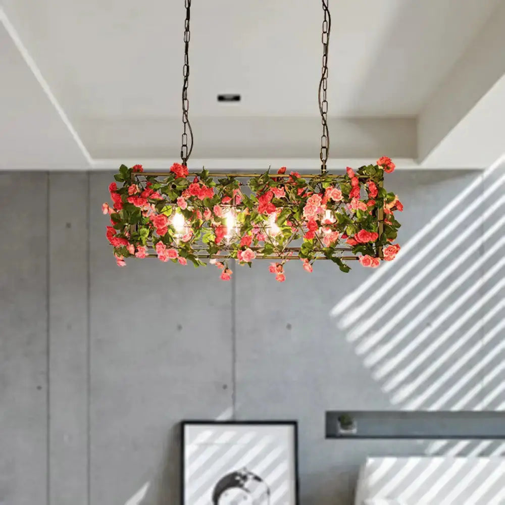 Industrial floral brass pendant light with pink roses and greenery, chain hung on Tampa Home & Garden Store