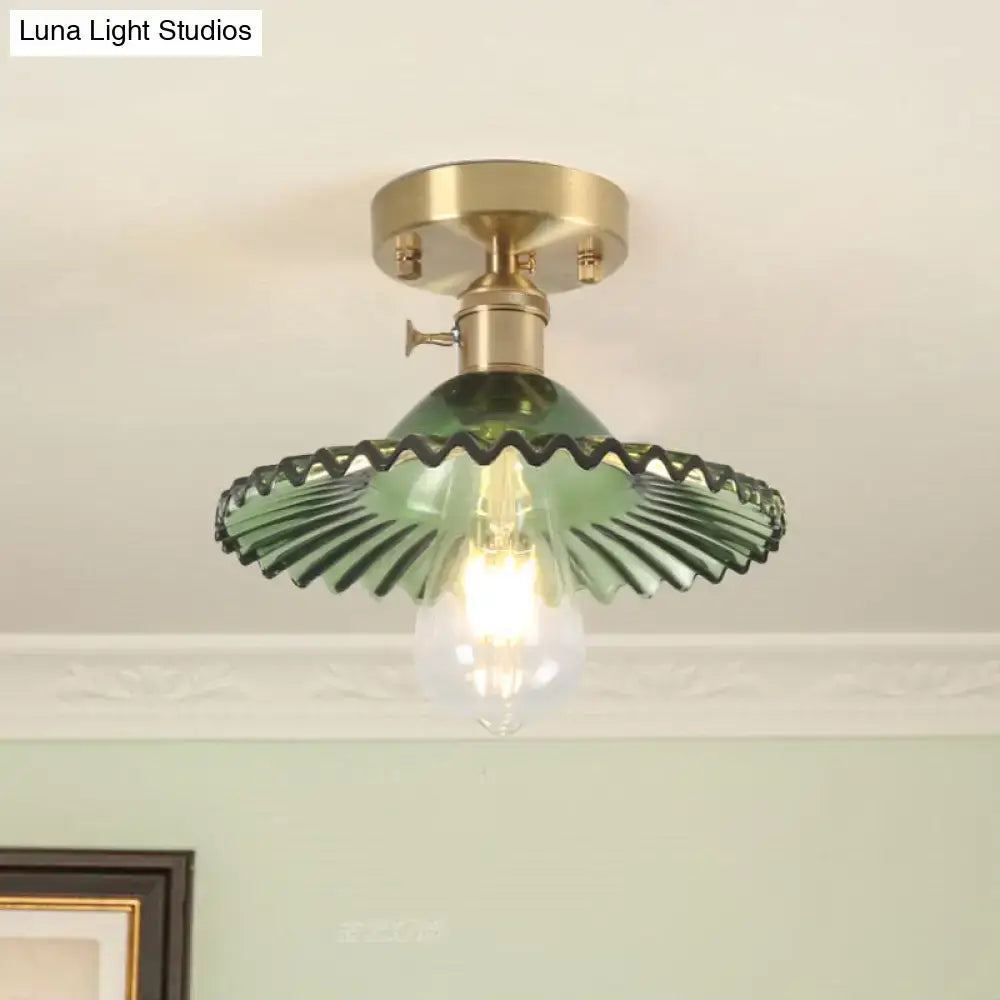 Scalloped green glass flush-mount ceiling light with brass fixture by Decorbites on Tampa Home & Garden Store