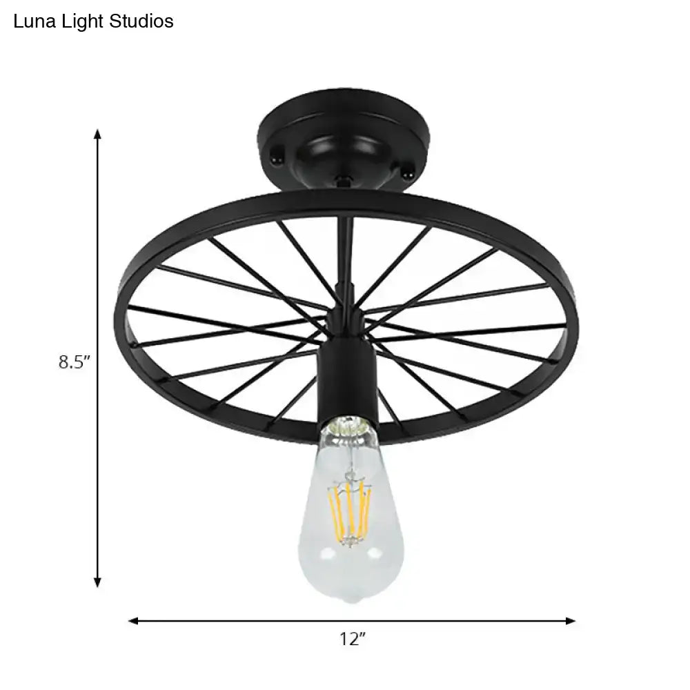 Black wheel ceiling light by Decorbites; metal wheel shade with Edison bulb, 12in wide on Tampa Home & Garden Store