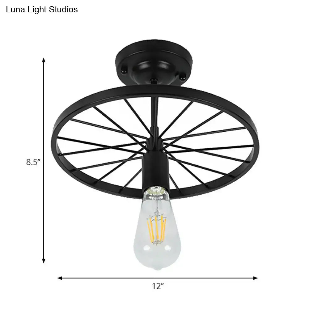 Black wheel ceiling light flush mount by Decorbites, 12 in wide metal frame with Edison bulb on Tampa Home & Garden Store