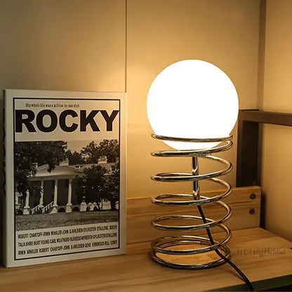 Decorbites Chrome Glass USB Lamp with spherical white globe atop a spiral chrome base on Tampa Home & Garden Store