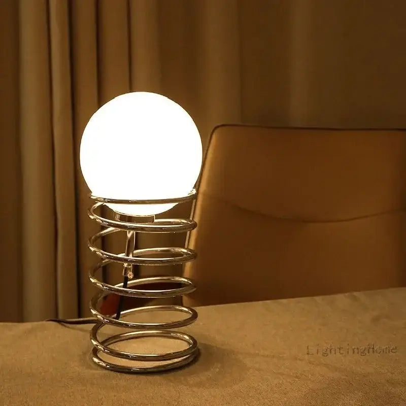 Chrome glass USB lamp with a spherical white globe atop a spiraled chrome base on Tampa Home & Garden Store