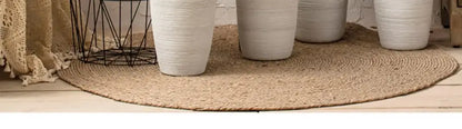 White Ribbed Ceramic Vase by Decorbites, set of 4 on a woven round rug on Tampa Home & Garden Store
