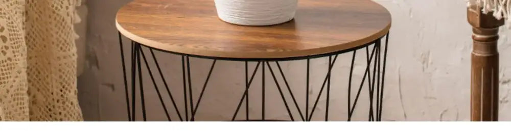 White ribbed ceramic vase by Decorbites on round wooden table on Tampa Home & Garden Store
