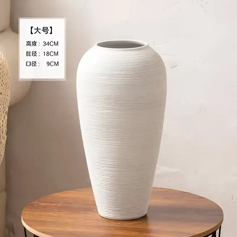 Tall white ribbed ceramic vase by Decorbites on Tampa Home & Garden Store