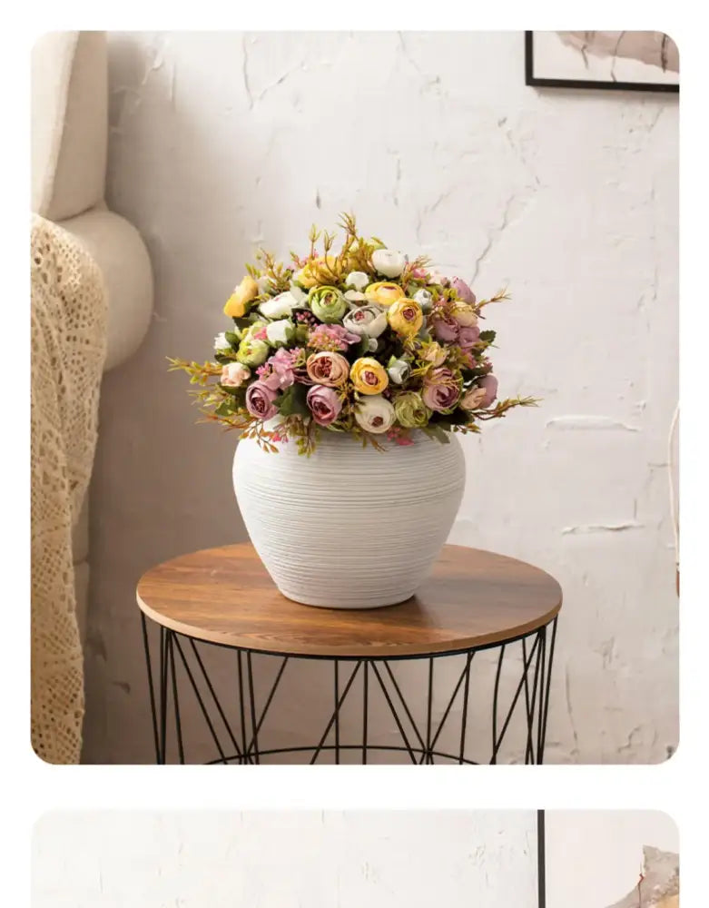 White ribbed ceramic vase by Decorbites with pastel flower bouquet on Tampa Home & Garden Store