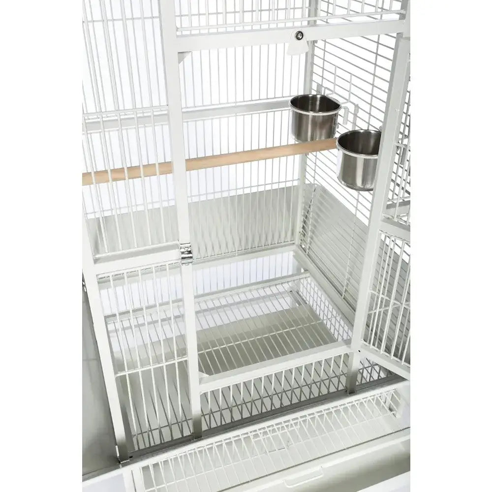 Chalk white metal birdcage with wooden perch and two side-mounted stainless steel bowls on Tampa Home & Garden Store