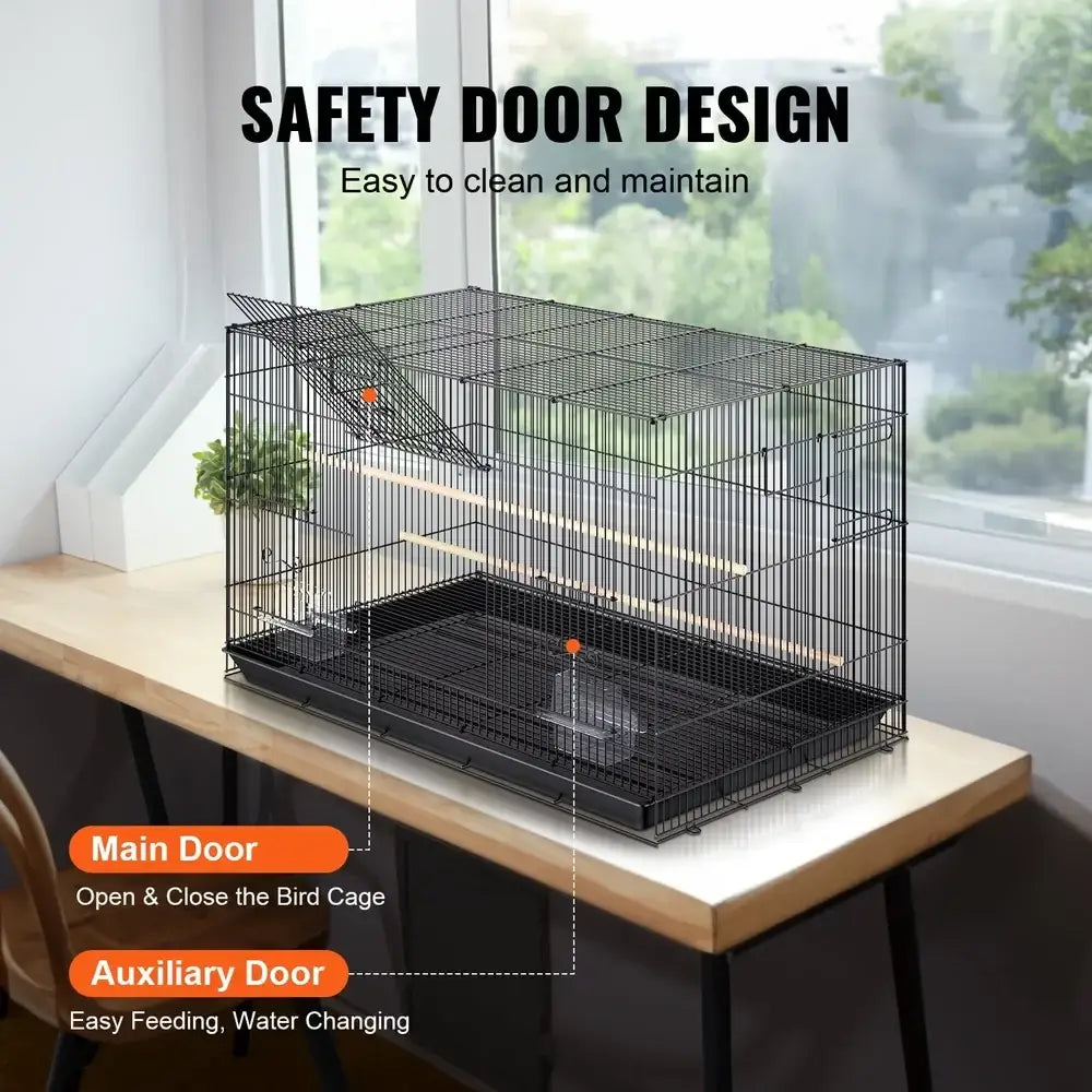 Decorbites large black metal bird cage for small birds with main and auxiliary doors on desk on Tampa Home & Garden Store