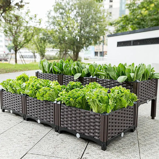 Decorbites woven brown outdoor planter boxes set of six with leafy greens on a patio on Tampa Home & Garden Store
