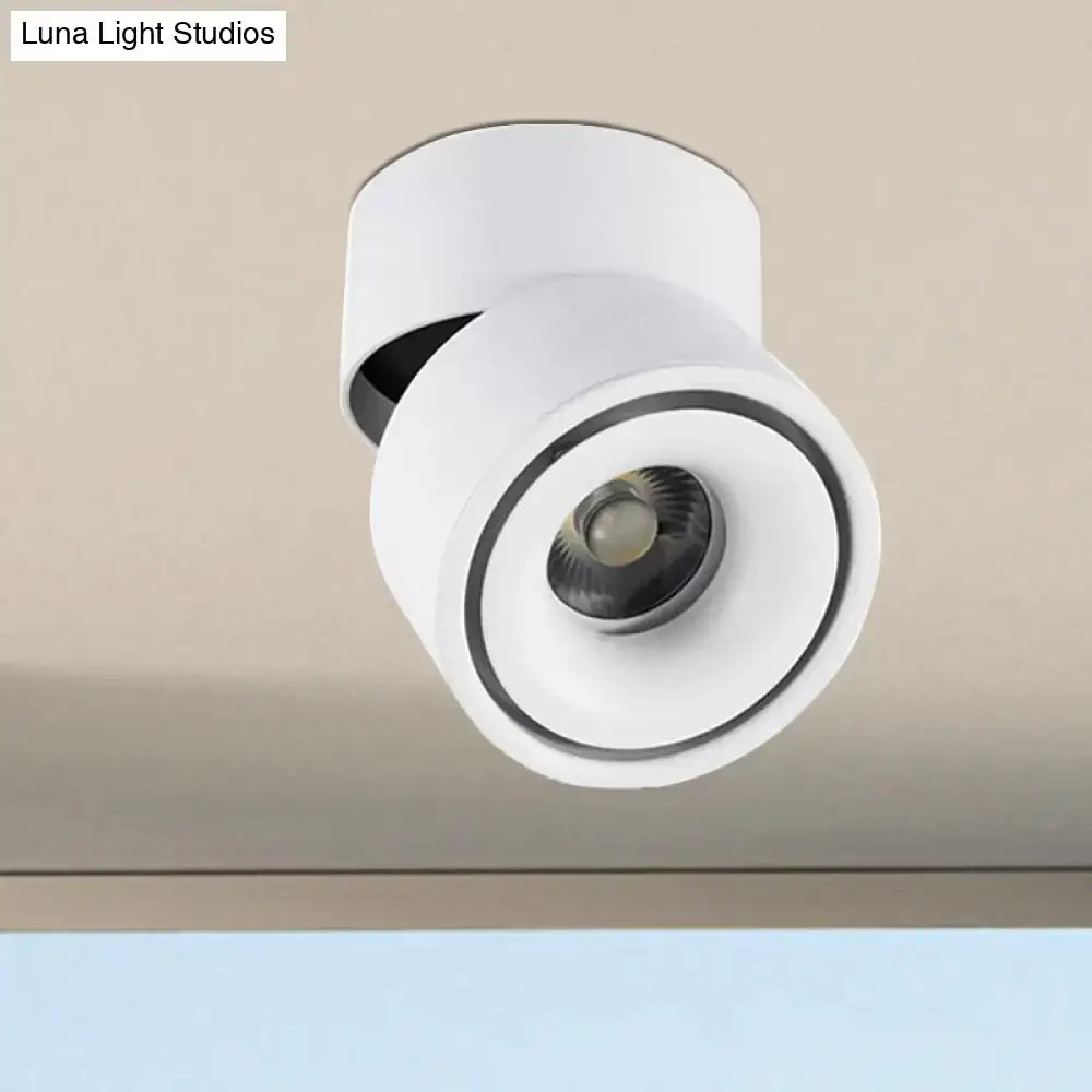 White round flush mount ceiling light with adjustable spotlight on Tampa Home & Garden Store