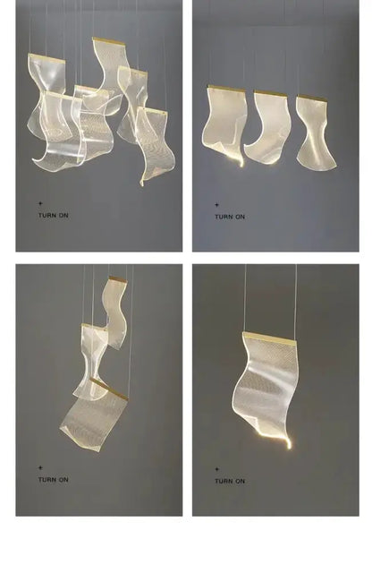 Chandelier: modern gold sculptural LED pendant with four wispy, wavy translucent panels on Tampa Home & Garden Store