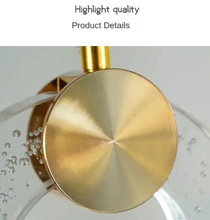 Modern gold LED crystal pendant light by Decorbites with brass disc and crystal accents on Tampa Home & Garden Store