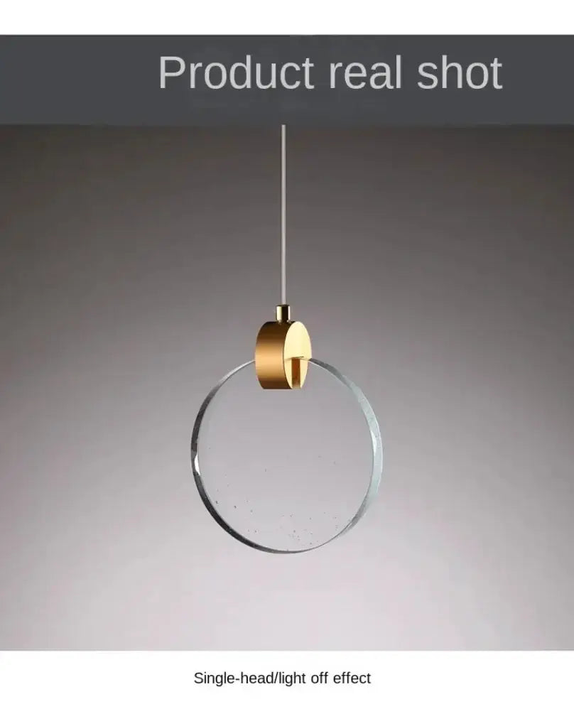 Modern gold LED crystal pendant light with circular glass disk by Decorbites for bedroom on Tampa Home & Garden Store