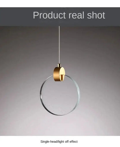 Modern gold LED crystal pendant light with circular glass disk by Decorbites for bedroom on Tampa Home & Garden Store