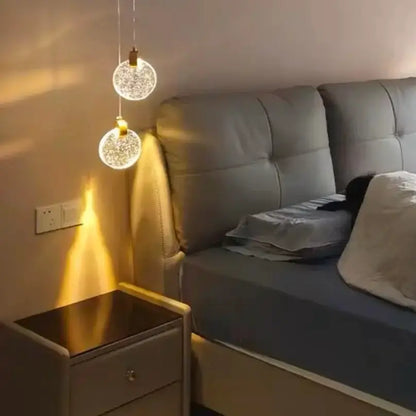 Gold LED crystal pendant lights bedroom two spheres above bedside table Tampa Store on Tampa Home & Garden Store