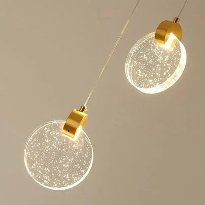Modern gold LED crystal pendant light by Decorbites with two glitter discs and hardware on Tampa Home & Garden Store