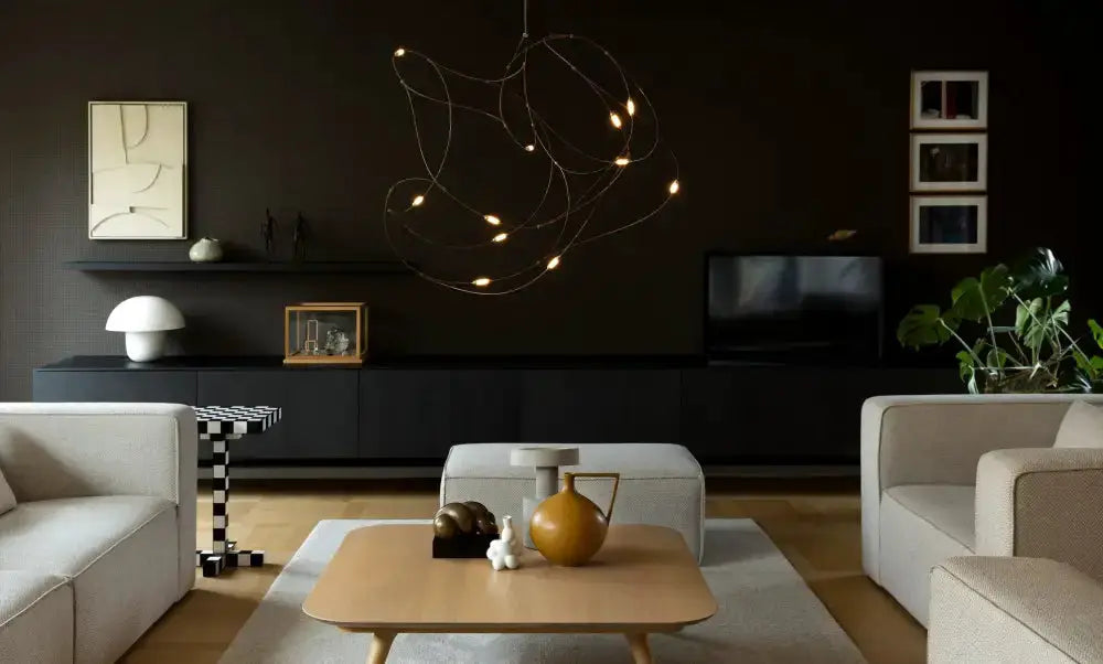 Chandelier: Decorbites modern minimal LED firefly pendant with black wire frame and warm LEDs on Tampa Home & Garden Store